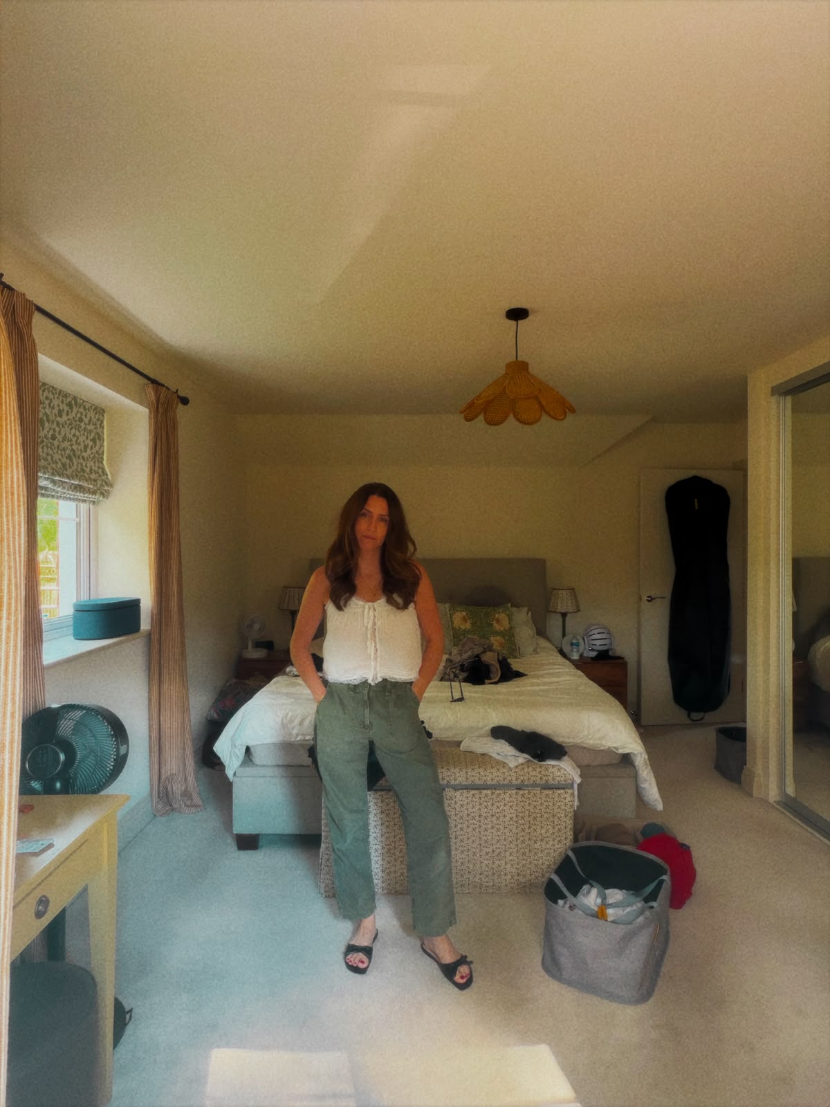 Blue top, and khaki trousers